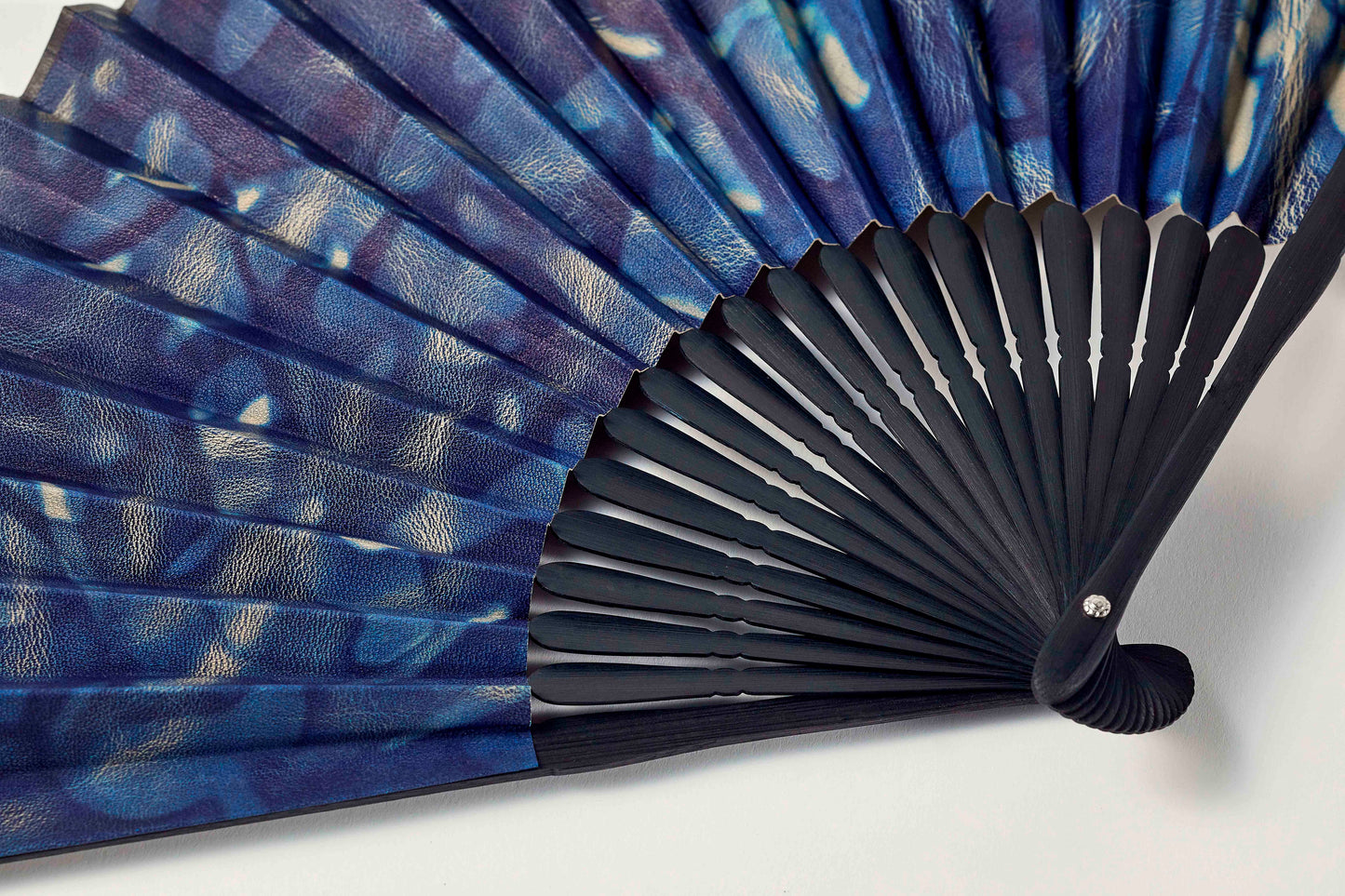 Folding fan / botanical leather® indigo dye / spotted / cowhide