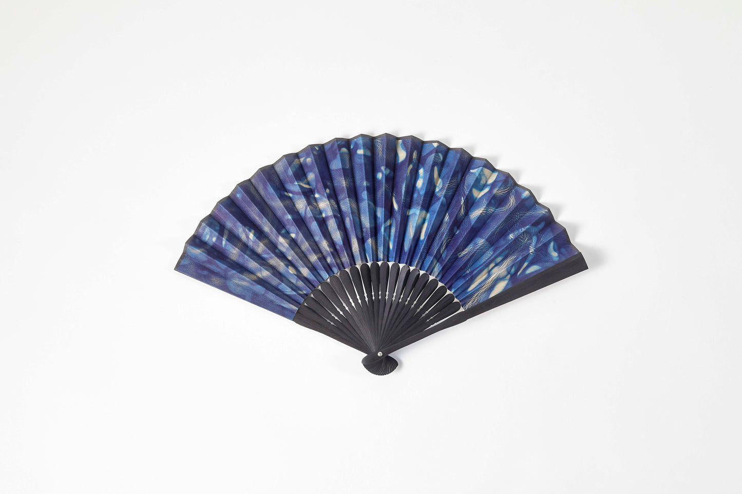 Folding fan / botanical leather® indigo dye / spotted / cowhide