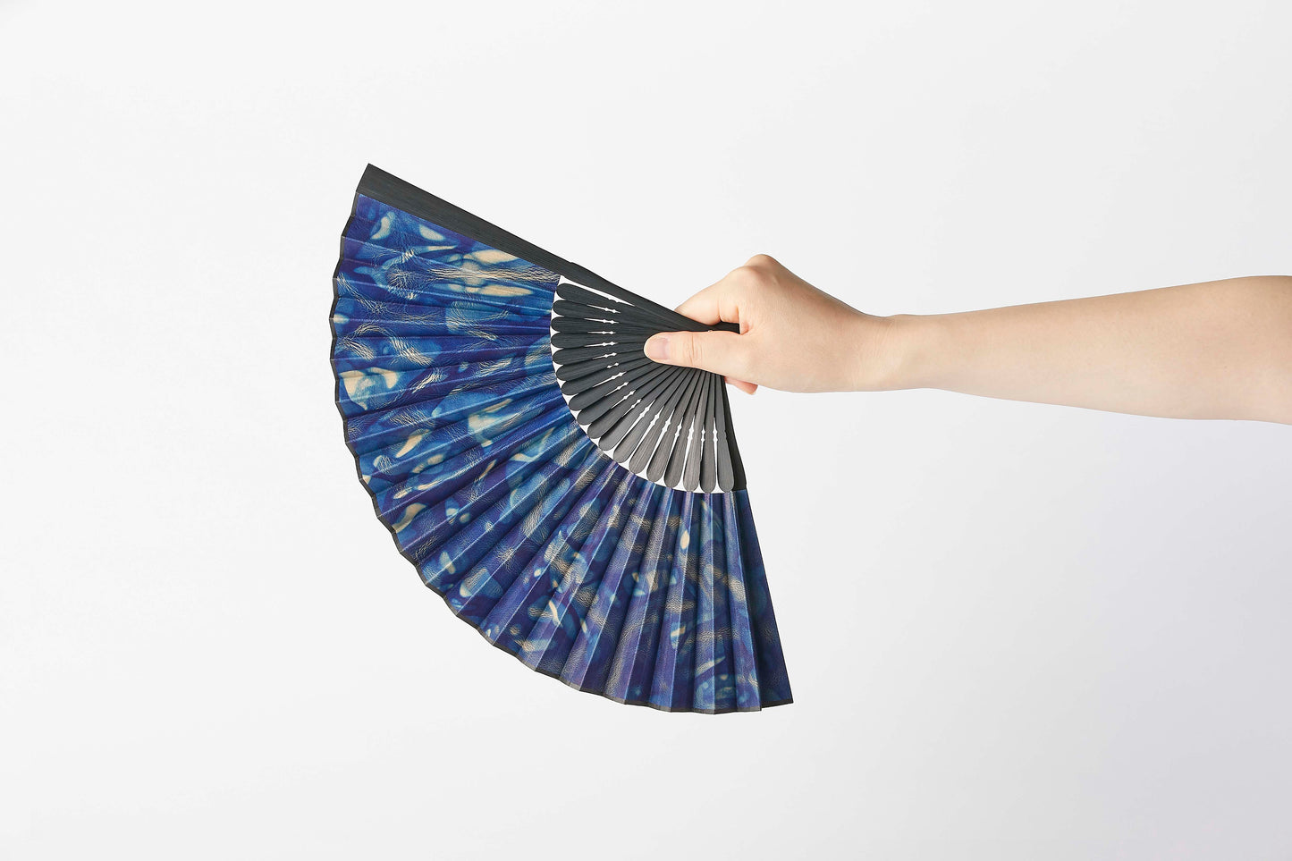 Folding fan / botanical leather® indigo dye / spotted / cowhide